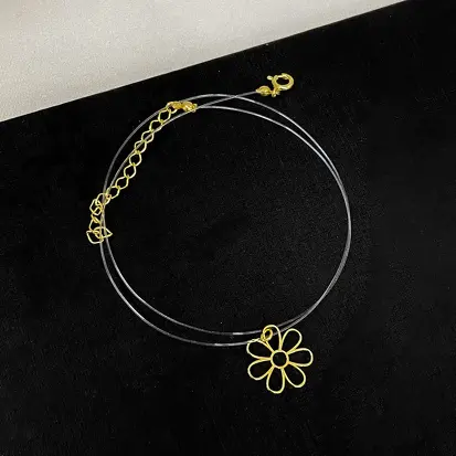 GARGANTILHA FLOR VAZADA FIO DE NYLON DOURADO